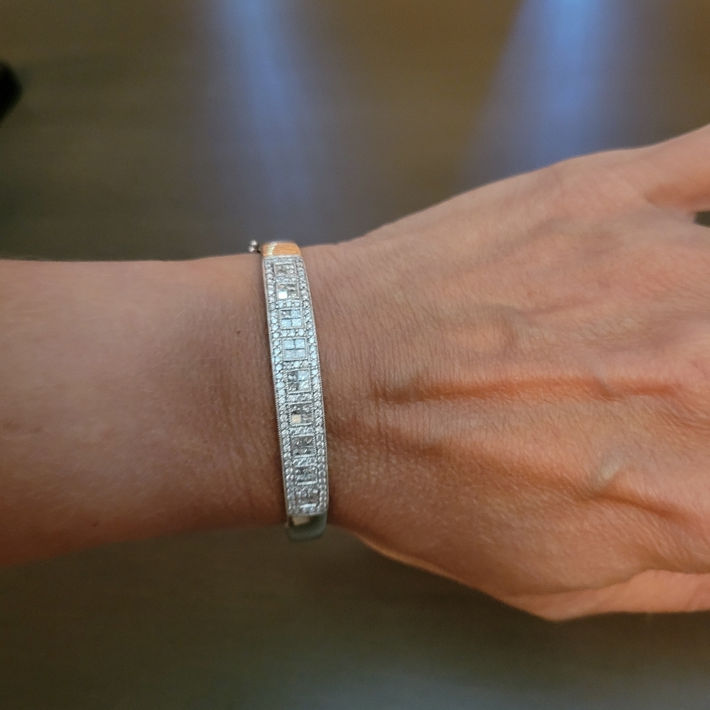 14k White Gold 1/2ct princess cut and round natural diamond bangle bracelet. It'